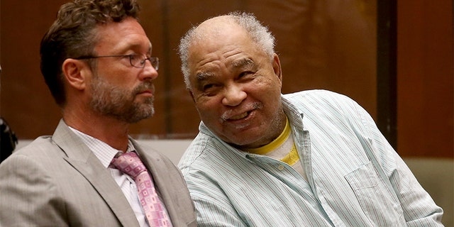 Samuel Little, right, appears unfazed after being convicted on three counts of first-degree murder on Tuesday, Sept. 2, 2014, in Los Angeles Superior Court. Little is believed to be tied to several other homicides of women in South Los Angeles in the 1980s. With him is public defender Michael Pentz.