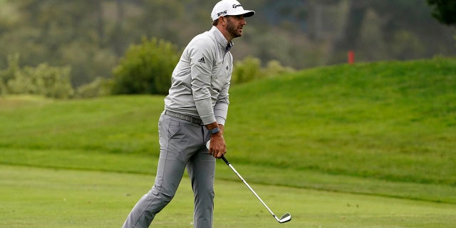 Dustin Johnson hits from the fairway on the 18th hole during the third round of the PGA Championship golf tournament at TPC Harding Park Saturday, Aug. 8, 2020, in San Francisco. (Associated Press)