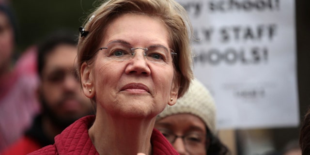 Sen. Elizabeth Warren, D-Mass., visits with striking Chicago teachers at Oscar DePriest Elementary School on October 22, 2019 in Chicago, Illinois. Warren said Tuesday that Tesla CEO Elon Musk is amassing a concerning amount of power and wealth.