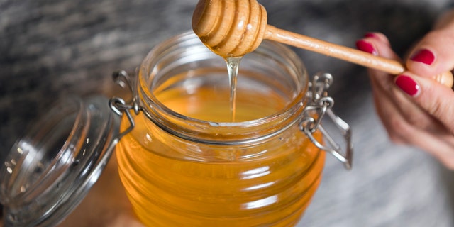 Honey appears to be more effective in treating cough and cold symptoms than antibiotics, according to a new study. (iStock)