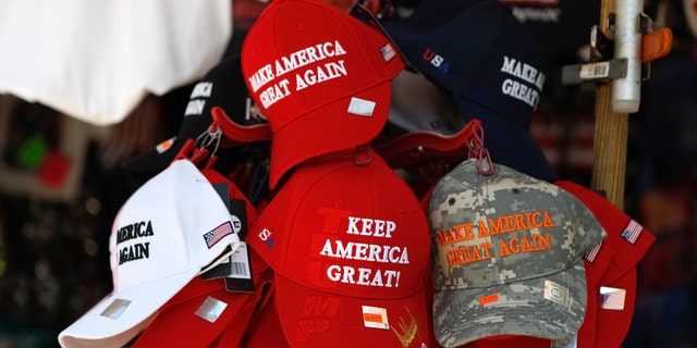 A street vendor selling public domain Donald Trump paraphernalia and souvenirs. The souvenirs are located right across the street from the White House and taken on the afternoon of July 21, 2019 near Pennslyvania Avenue in Washington, D.C.