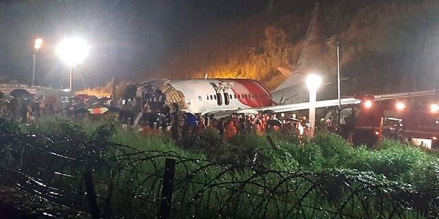 The Air India Express flight that skidded off a runway while landing at the airport in Kozhikode, Kerala state, India, Friday, Aug. 7, 2020. (Associated Press)