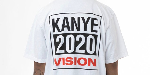 A white T-shirt with a block-lettered logo reads "Kanye 2020 vision.”