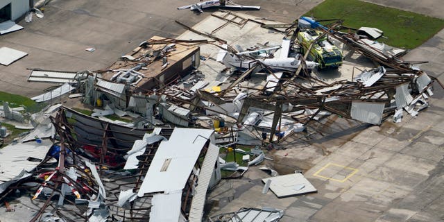 A airplane hangar at the Lake Charles Regional Airport was destroyed by Hurricane Laura. (AP)