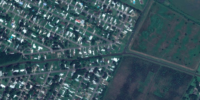 Homes near Flounder Drive in Lake Charles in June 2019. (AP/Maxar Technologies)