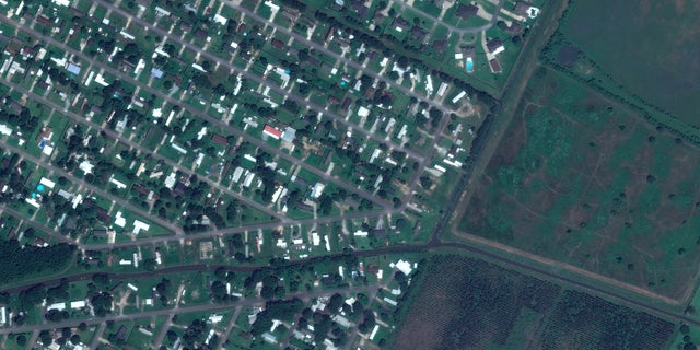 Homes near Flounder Drive in Lake Charles in June 2019. (AP/Maxar Technologies)