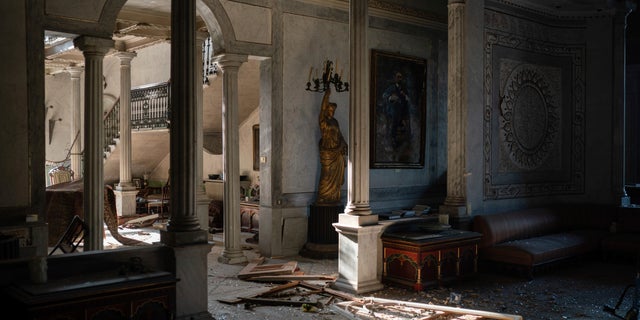 Broken glass and window frames lay on the floor of the Sursock Palace, heavily damaged after the explosion in the seaport of Beirut, Lebanon, on Aug. 7. (AP)
