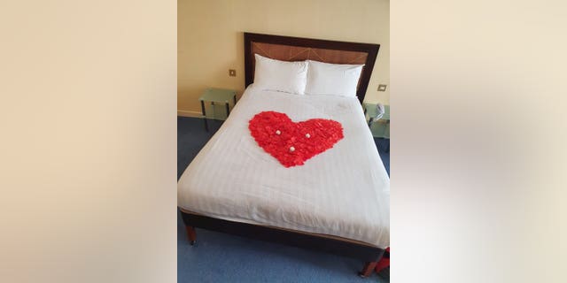 Wright had secretly planned the proposal, including laying rose petals on the bed and buying a bottle of champagne ready for Harvey to walk in.