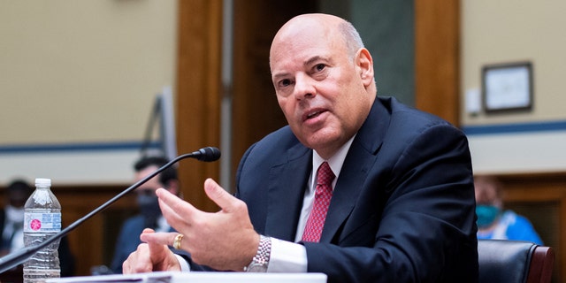 Postmaster General Louis DeJoy testifies before a House Oversight and Reform Committee hearing on slowdowns at the Postal Service ahead of the November elections on Capitol Hill in Washington, Aug. 24, 2020. (Tom Williams/Pool via REUTERS