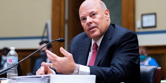Postmaster General Louis DeJoy testifies before a House Oversight and Reform Committee hearing on slowdowns at the Postal Service ahead of the November elections on Capitol Hill in Washington, Aug. 24, 2020. (Tom Williams/Pool via REUTERS