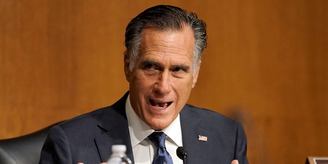 Sen. Mitt Romney, R-Utah, asks a question to Secretary of State Mike Pompeo during a Senate Foreign Relations committee hearing on the State Department's 2021 budget on Capitol Hill Thursday, July 30, 2020, in Washington. (Greg Nash/Pool via AP)