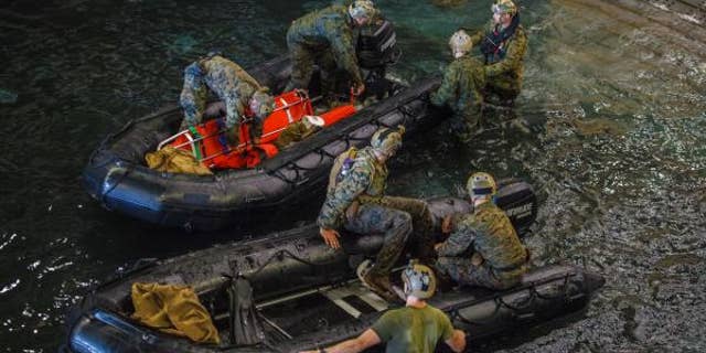 U.S. Marines and U.S. Navy sailors take part in a search for the remains of eight fellow service members off the coast of California. (15th Marine Expeditionary Unit)