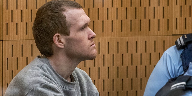 Australian Brenton Harrison Tarrant, 29, sits in the dock on day three at the Christchurch High Court for sentencing after pleading guilty to 51 counts of murder, 40 counts of attempted murder and one count of terrorism in Christchurch, New Zealand, Wednesday, Aug. 26, 2020. More than 60 survivors and family members will confront the New Zealand mosque gunman this week when he appears in court to be sentenced for his crimes in the worst atrocity in the nation's modern history. (John Kirk-Anderson/Pool Photo via AP)