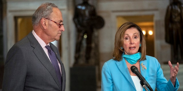 Pelosi and Schumer speak to media on Capitol Hill in Washington, Aug. 5, 2020.  (AP Photo/Carolyn Kaster)