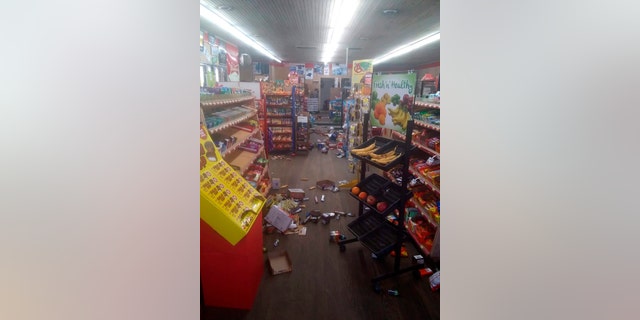 Various items litter the floor of the 4 Brothers Store in Sparta, N.C. after an earthquake shook much of North Carolina early Sunday, Aug. 9, 2020.