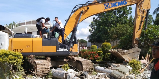 . A powerful and shallow earthquake struck a central Philippine region Tuesday, prompting people to dash out of homes and offices.