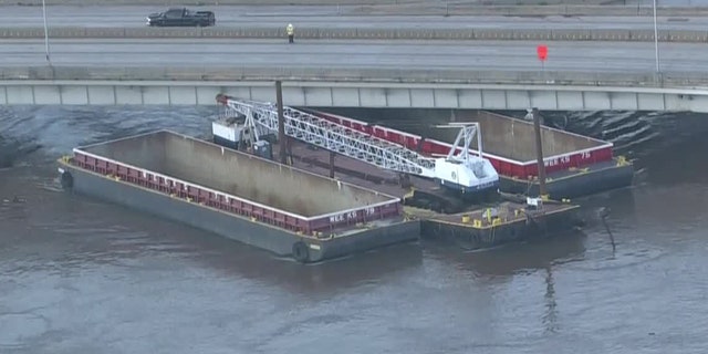 The Vine Street Expressway in Philadelphia was closed in both directions Wednesday morning due to an unsecured barge that was knocked free due to flooding from Tropical Storm Isaias.