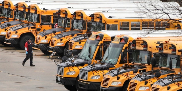 Reopening schools during the coronavirus pandemic means putting children on school buses, and districts are working on plans to limit the risk. (AP Photo/Charles Krupa, File)
