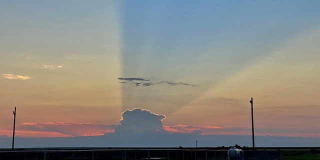 A thunderstorm casts a 75-mile shadow that obscured the sunrise in Goodland, Kan., on Aug. 4, 2020.