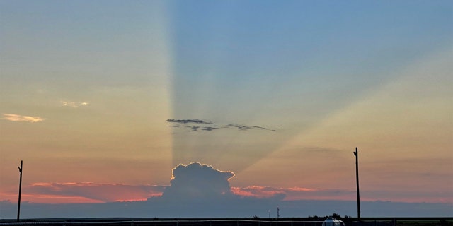 A thunderstorm casts a 75-mile shadow that obscured the sunrise in Goodland, Kan., on Aug. 4, 2020.