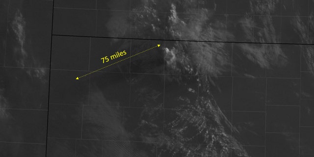 The 75-mile-long shadow by a thunderstorm in Kansas can be seen at sunrise on Aug. 4, 2020.
