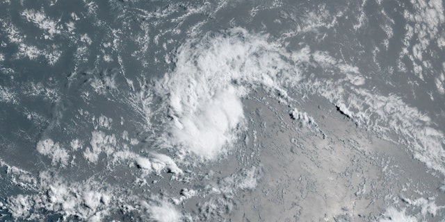 Tropical Depression 11 can be seen early Wednesday over the Atlantic. It is forecast to form into the next tropical storm.