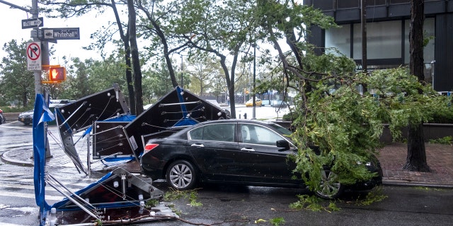 Damage is seen Tuesday, Aug. 4, 2020 in lower Manhattan as Tropical Storm Isaias moved past New York.