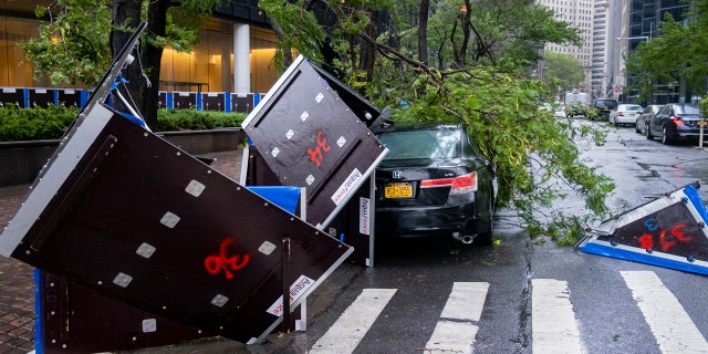 Damage is seen Tuesday, Aug. 4, 2020 in lower Manhattan as Tropical Storm Isaias moved past New York, producing strong winds that at times caused damage.