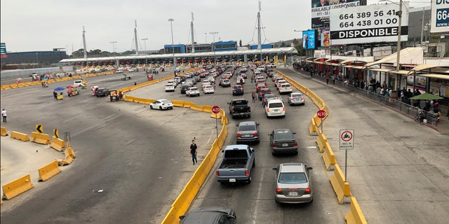 Cars wait in line to enter the United States at San Diego's San Ysidro border crossing on Tuesday in Tijuana, Mexico. (AP)