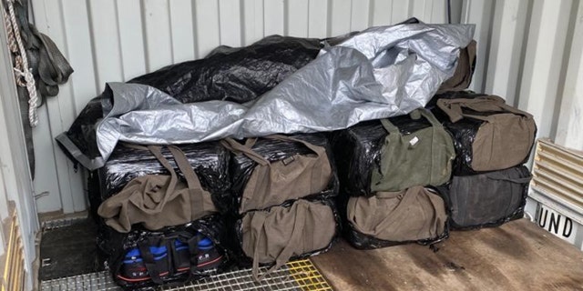 Some of the 28 bags of cocaine recovered near the crash site. (Australian Federal Police.)