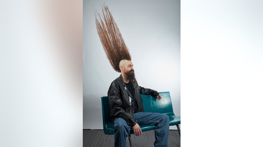 Frigid temperature from polar vortex freezes woman's hair in place