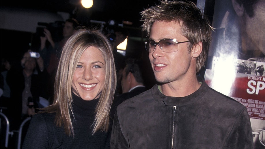Brad Pitt and Jennifer Aniston attend 'Spy Game' Westwood Premiere