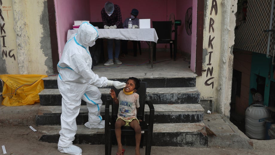 India hits 2 million coronavirus cases as health volunteers strike