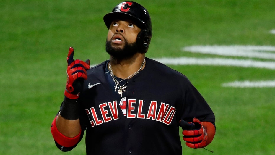 Indians' Carlos Santana wears retired, controversial logo under jersey