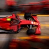 Mechanics practice a tire change on Charles Leclerc's Ferrari during preparations ahead of the Formula One Grand Prix at the Barcelona Catalunya racetrack in Montmelo, Spain, Aug. 13, 2020. 