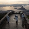 Soldiers disinfect the closed Christ the Redeemer site to prepare for what tourism officials hope will be a surge in visitors in the upcoming weekend as health restrictions are eased amid the new coronavirus pandemic in Rio de Janeiro, Brazil, Aug. 13, 2020. 