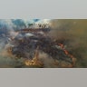 Fire consumes land recently deforested by cattle farmers in the Amazon forest in Novo Progresso, Brazil, Aug. 23, 2020. 