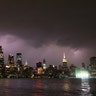 Lightning lights up the sky behind Midtown Manhattan and the Empire State Building ahead of the expected arrival of Hurricane Isaias in New York City, Aug. 3, 2020 