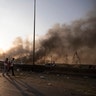 A smoke from a massive explosion is seen in in Beirut, Lebanon Tuesday.