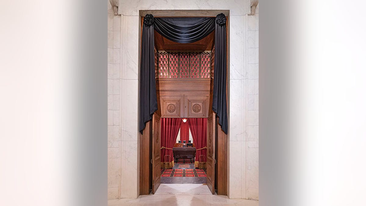 The Courtroom doors draped in black following the death of Supreme Court Associate Justice Ruth Bader Ginsburg, Sept. 18, 2020. (Fred Schilling/US Supreme Court)