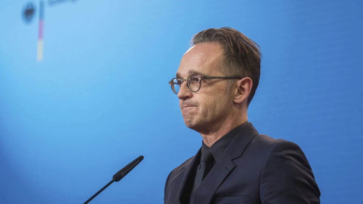 FILE-In this Sept. 2, 2020 file photo German Foreign Minister Heiko Maas attends a press conference at the Foreign Ministry in Berlin, Germany. Germany is increasing pressure on Russia over the poisoning of Russian opposition politician Alexei Navalny, warning that a lack of support by Moscow in the investigation could “force” Germany to rethink the fate of a German-Russian pipeline project. (Stefanie Loos/Pool via AP)