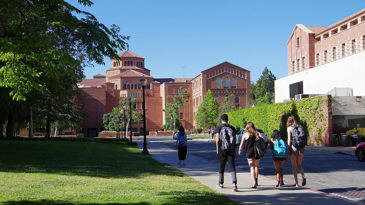 Los Angeles, California, USA - May 2, 2017. The location is University of California, Los Angeles. Large group of students walking about at the University campus.