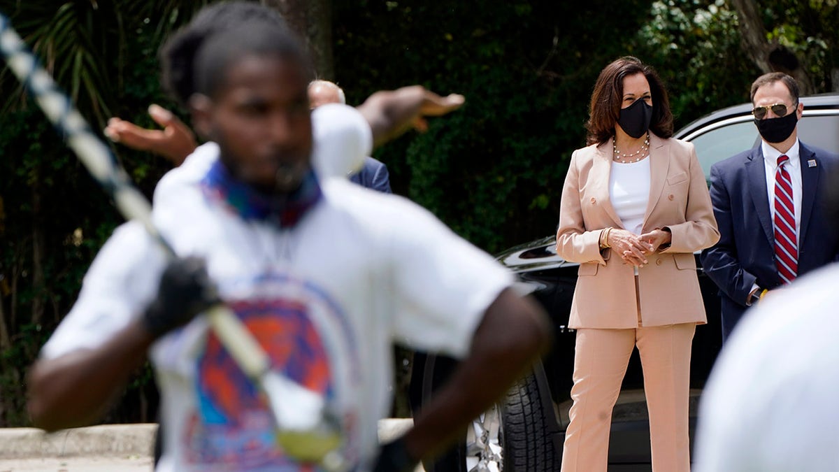 Democratic vice presidential candidate Sen. Kamala Harris, D-Calif., listens to the Florida Memorial University marching band Thursday, Sept. 10, 2020, in Miami Gardens, Fla. (AP Photo/Lynne Sladky)