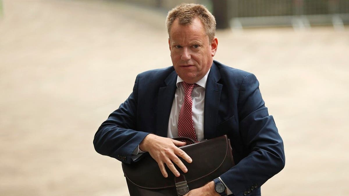 FILE - In this file photo dated Monday, Oct. 7, 2019, United Kingdom's Brexit adviser David Frost arrives at EU headquarters for a technical meeting on Brexit, in Brussels. (AP Photo/Francisco Seco, FILE)