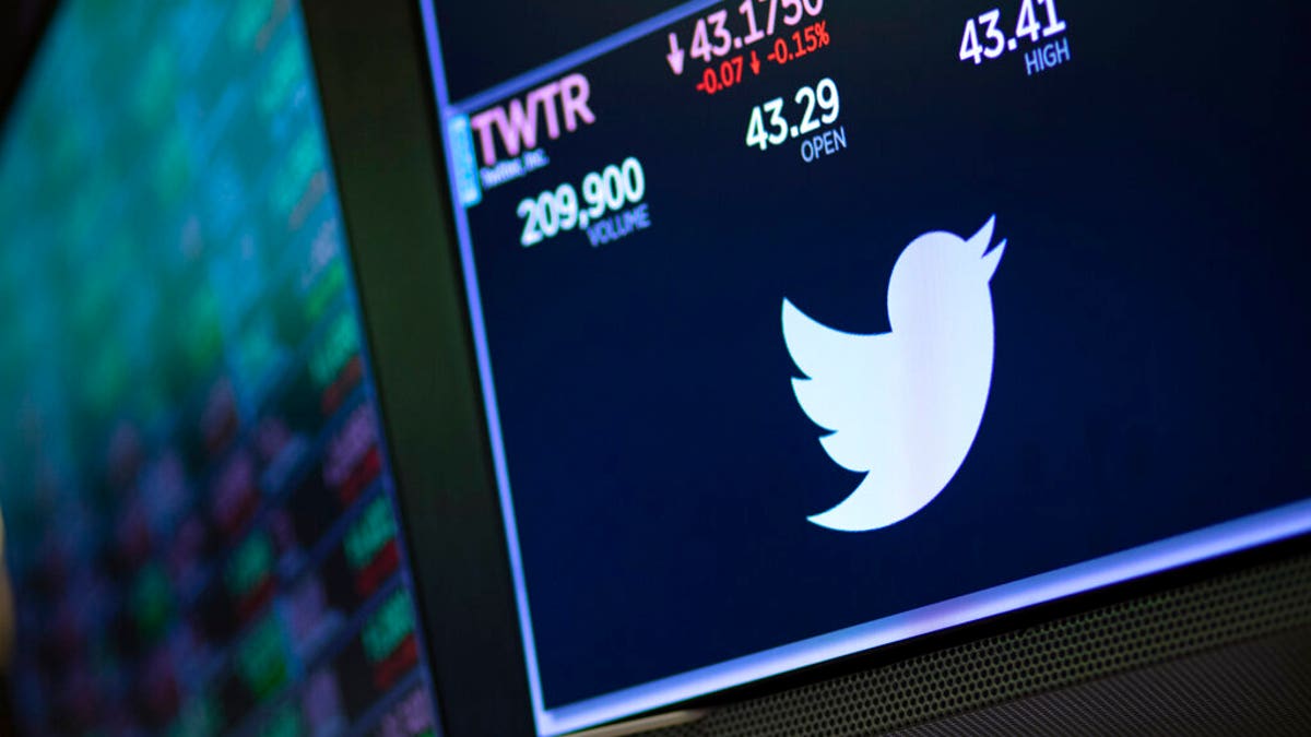 a screen shows the price of Twitter stock at the New York Stock Exchange