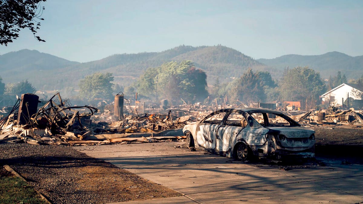 This photo taken by Talent, Ore., resident Kevin Jantzer shows the destruction of his hometown in the aftermath of wildfires that ravaged the central Oregon town near Medford, Sept. 9. (Kevin Jantzer via AP)