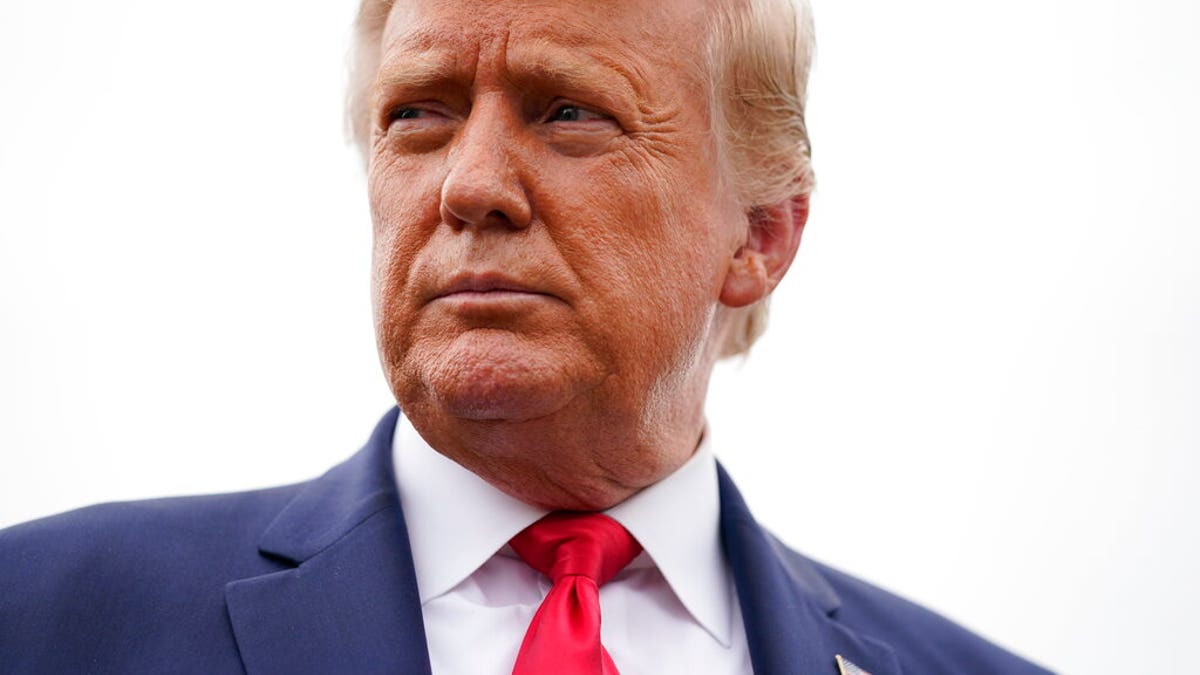 President Donald Trump speaks to the press before boarding Air Force One for a trip to a campaign rally in Freeland, Mich., Sept. 10, in Andrews Air Force Base, Md. (AP Photo/Evan Vucci)