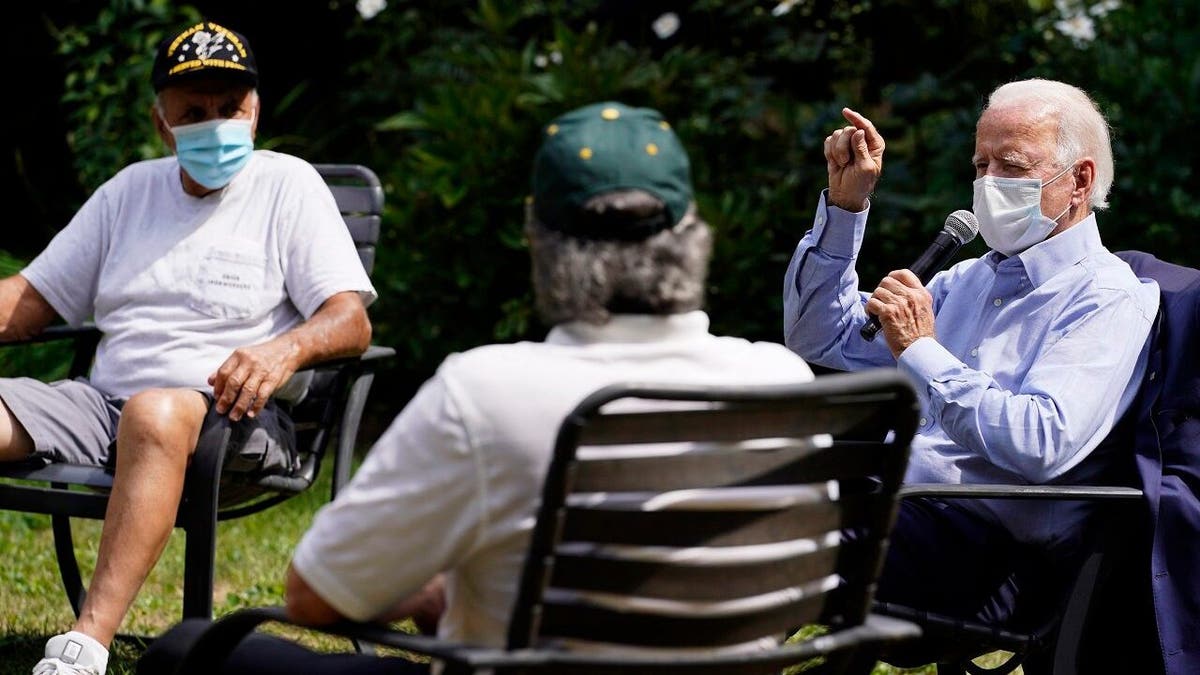 In this Sept. 7, 2020, file photo Democratic presidential candidate former Vice President Joe Biden speaks during an event with local union members in the backyard of a home in Lancaster, Pa. (AP Photo/Carolyn Kaster, File)