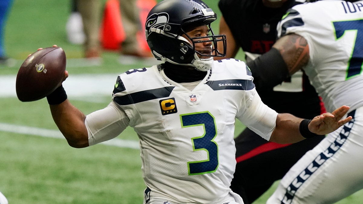 Seattle Seahawks quarterback Russell Wilson (3) works in the p[ocket against the Atlanta Falcons during the first half of an NFL football game, Sunday, Sept. 13, 2020, in Atlanta. (AP Photo/Brynn Anderson)