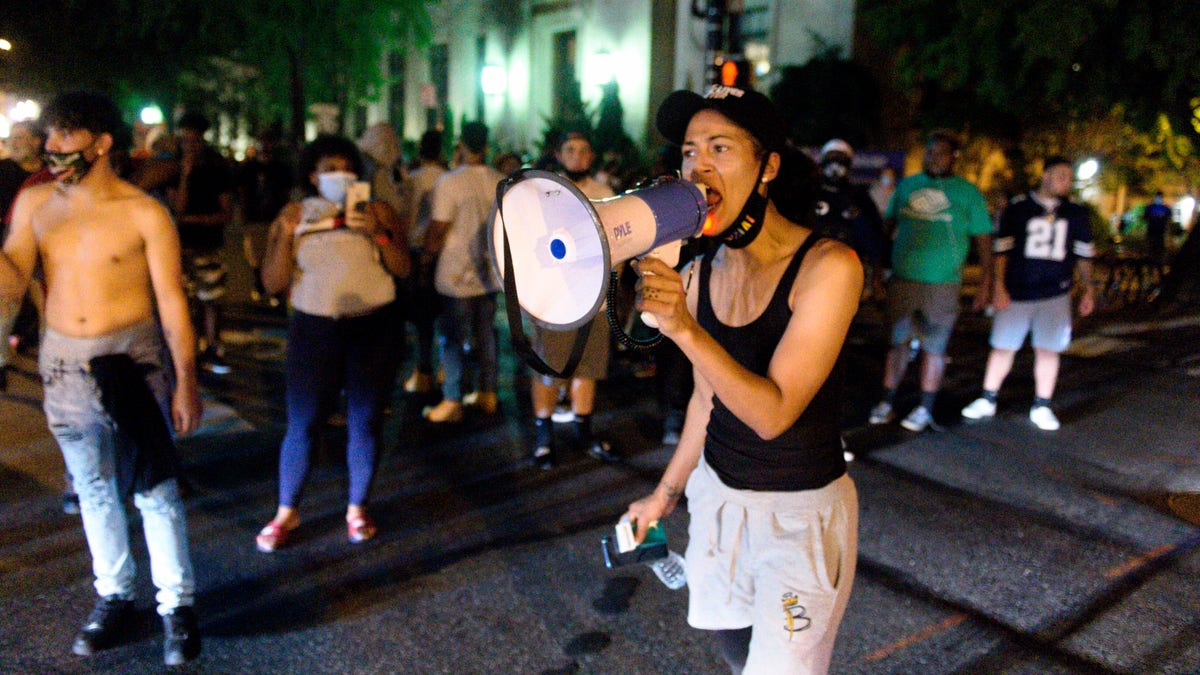 Black Lives Matter protesters block West Chestnut Street at North Prince Street near the Lancaster city police station on Sunday, Sept. 13, 2020. Blaine Shahan, LNP/LancasterOnline via AP)